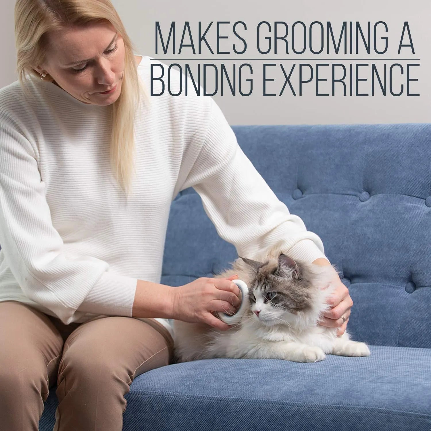 Blue pet deshedding and dematting comb with soft teeth and ergonomic handle.