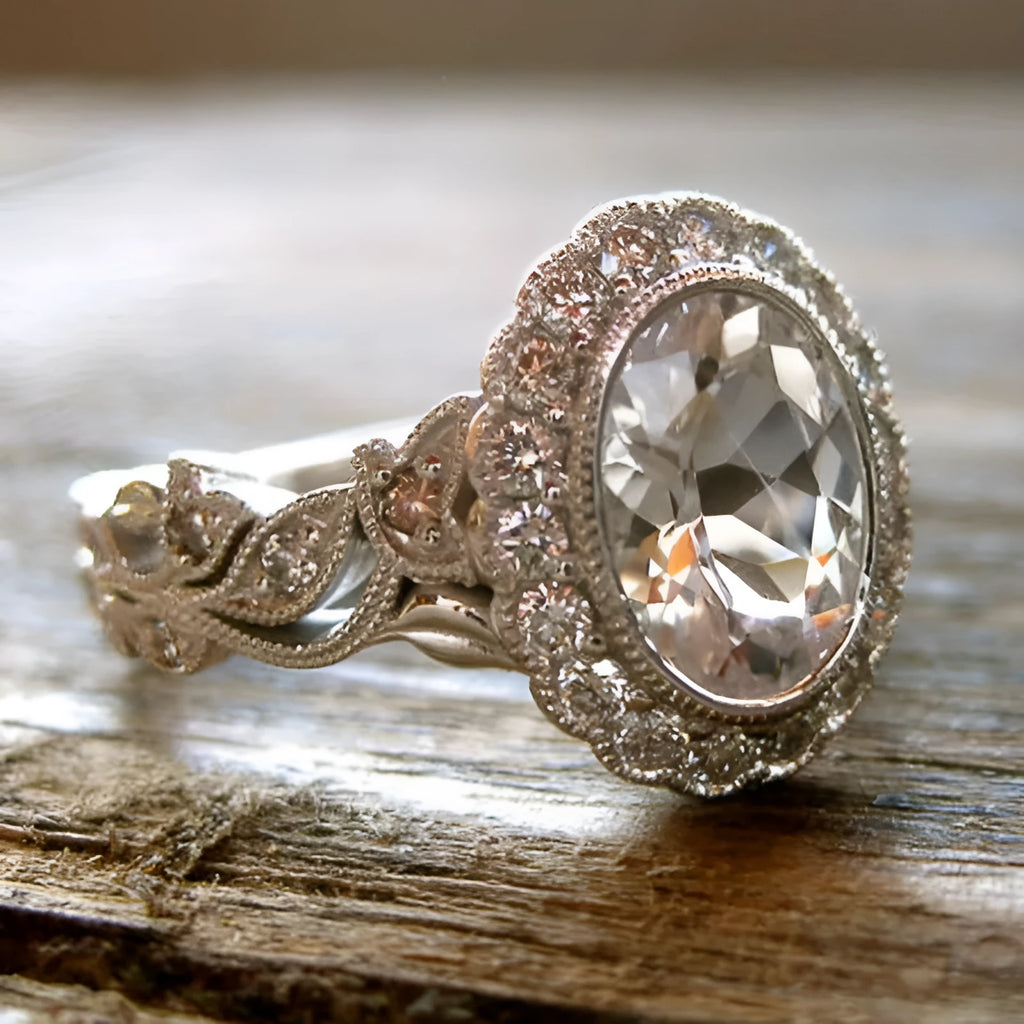 Geometric white gold plated copper ring with round zircon centrepiece on finger