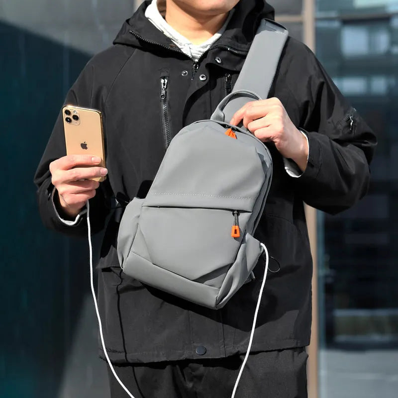 Men's black waterproof crossbody bag with single shoulder strap