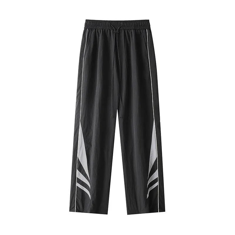 Men's straight-leg trousers in black or grey, featuring an elastic waist and loose fit.