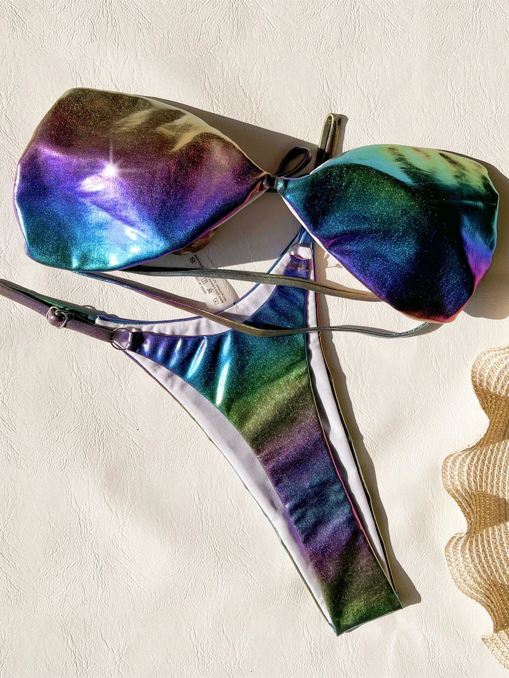 Gradient purple women's bikini swimsuit set on a mannequin.