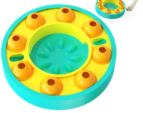 Lake blue interactive dog slow feeder bowl with central column and food turntable on a floor.