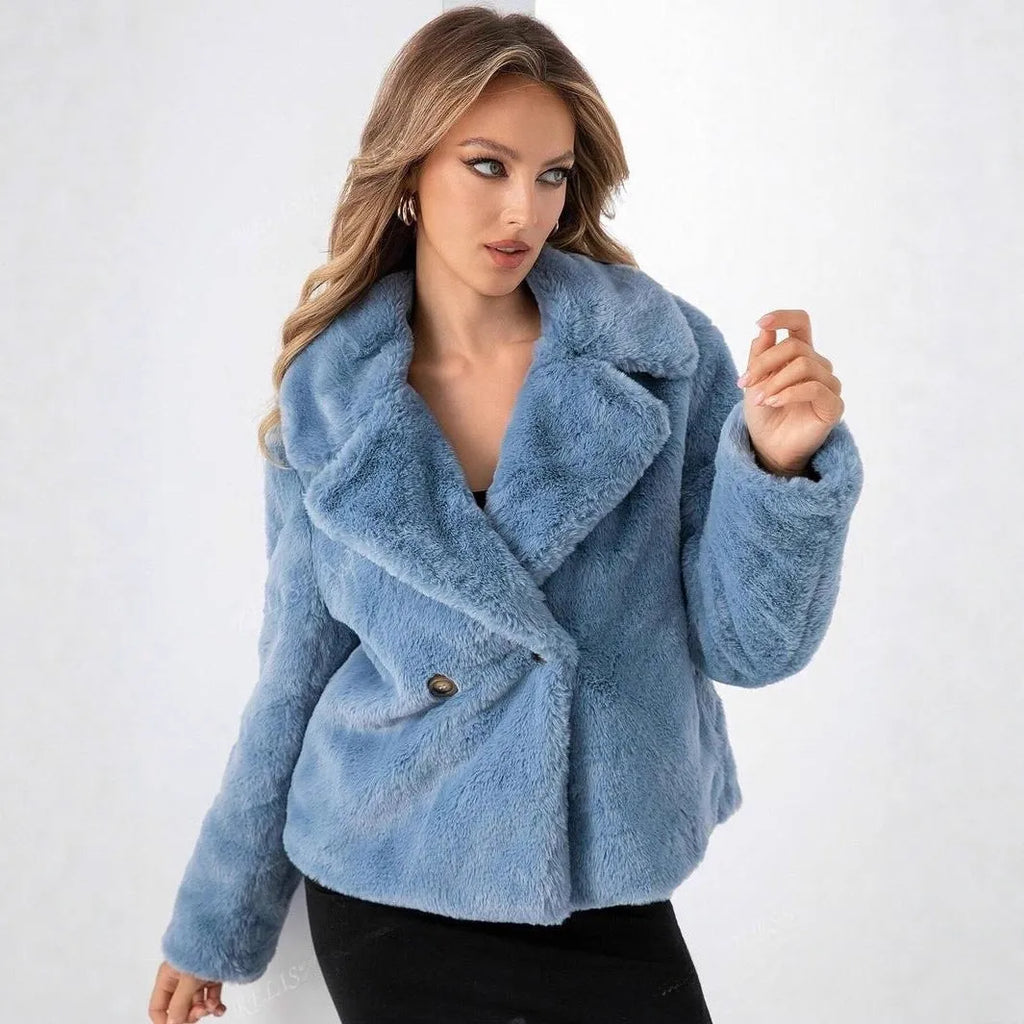 Women's loose short faux fur coat in rose red, showing regular sleeves and a textured fabric.