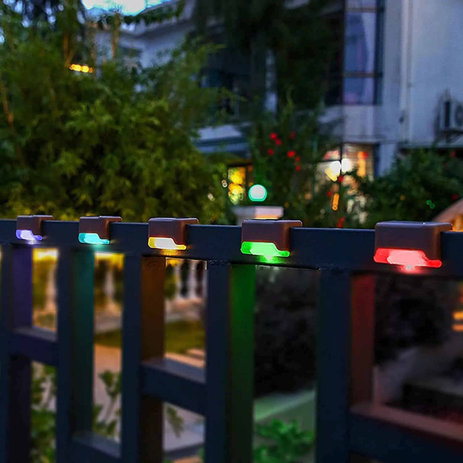 Brown solar step light with warm LED output on outdoor stairs, 4 pack