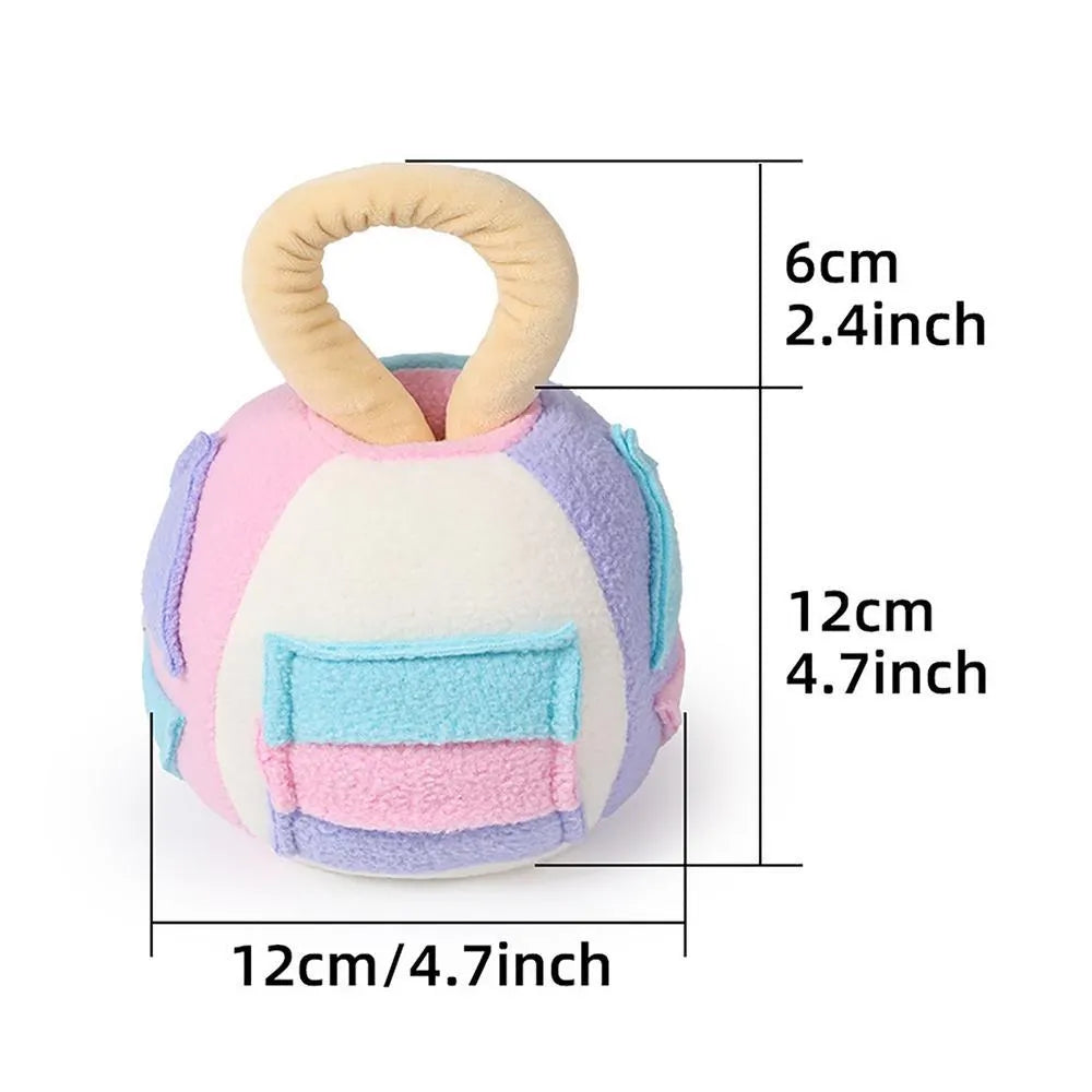 Green and pink plush squeaky ball dog toy with treat pockets measuring 12x12x18 cm