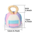 Green and pink plush squeaky ball dog toy with treat pockets measuring 12x12x18 cm