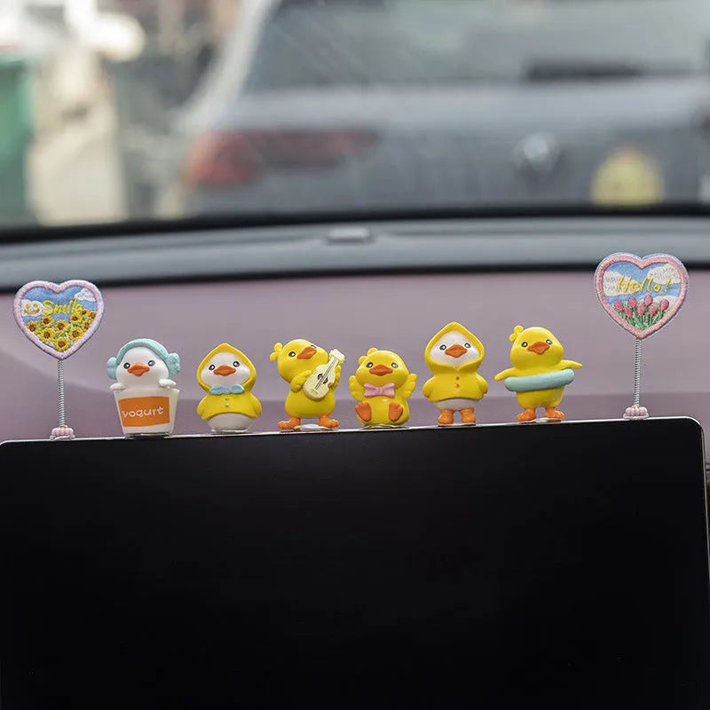 PVC duckling car interior decoration set showing six cartoon ducks and custom sign for vehicle dashboard