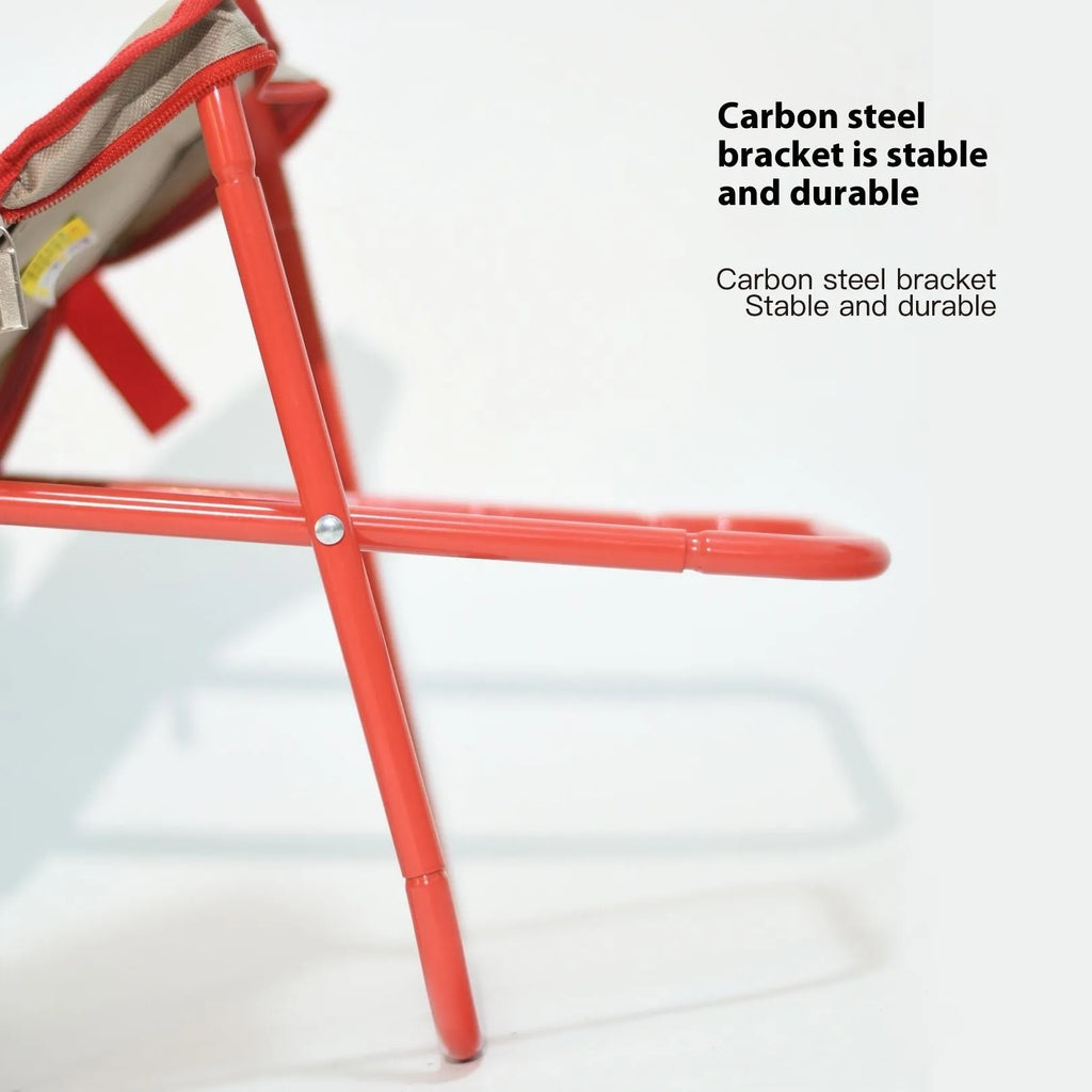 A foldable outdoor camping stool in Oxford cloth, shown in a khaki colour, folded compactly.