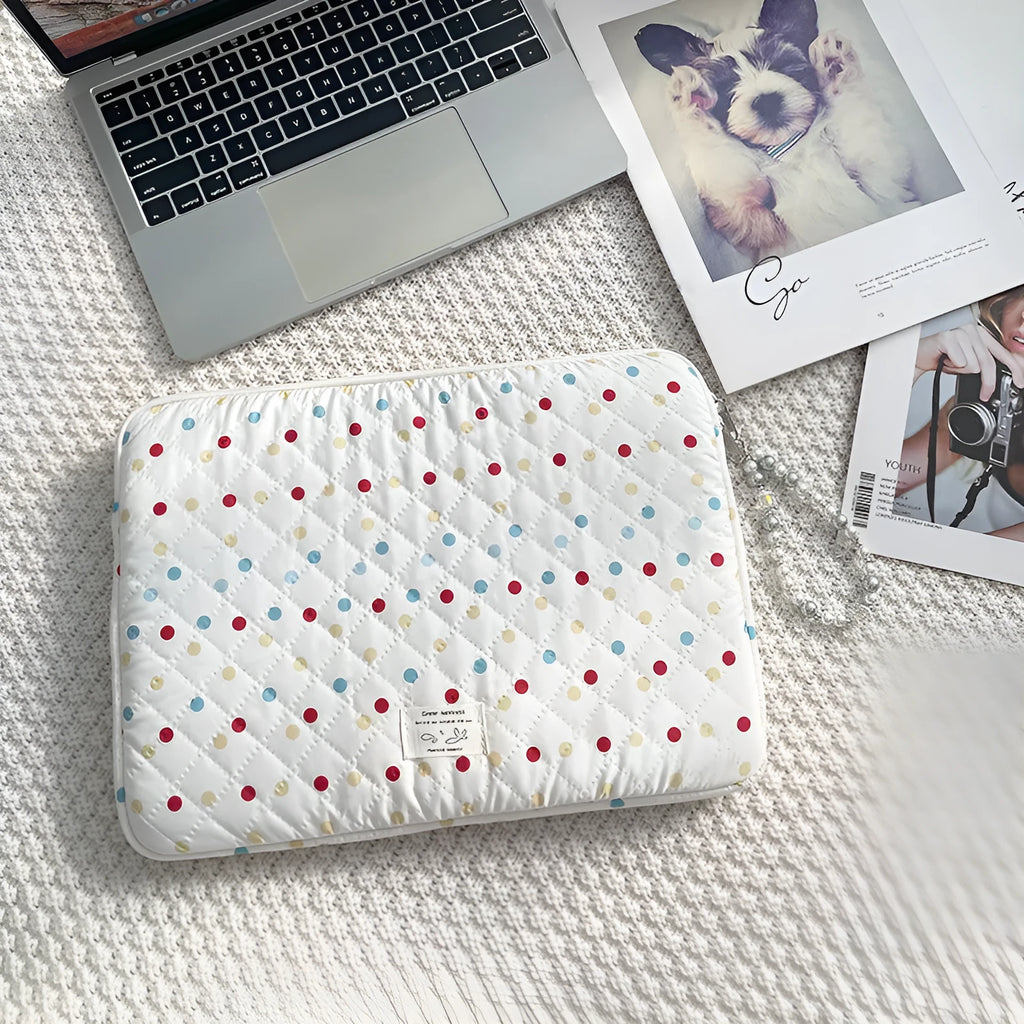 Women's polka dot polyester laptop bag shown in solid colour, suitable for 11-inch to 15.6-inch devices.