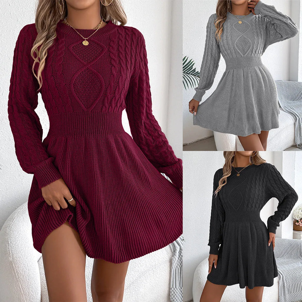A solid colour sweater dress with lantern sleeves and an elastic waist, shown in black.