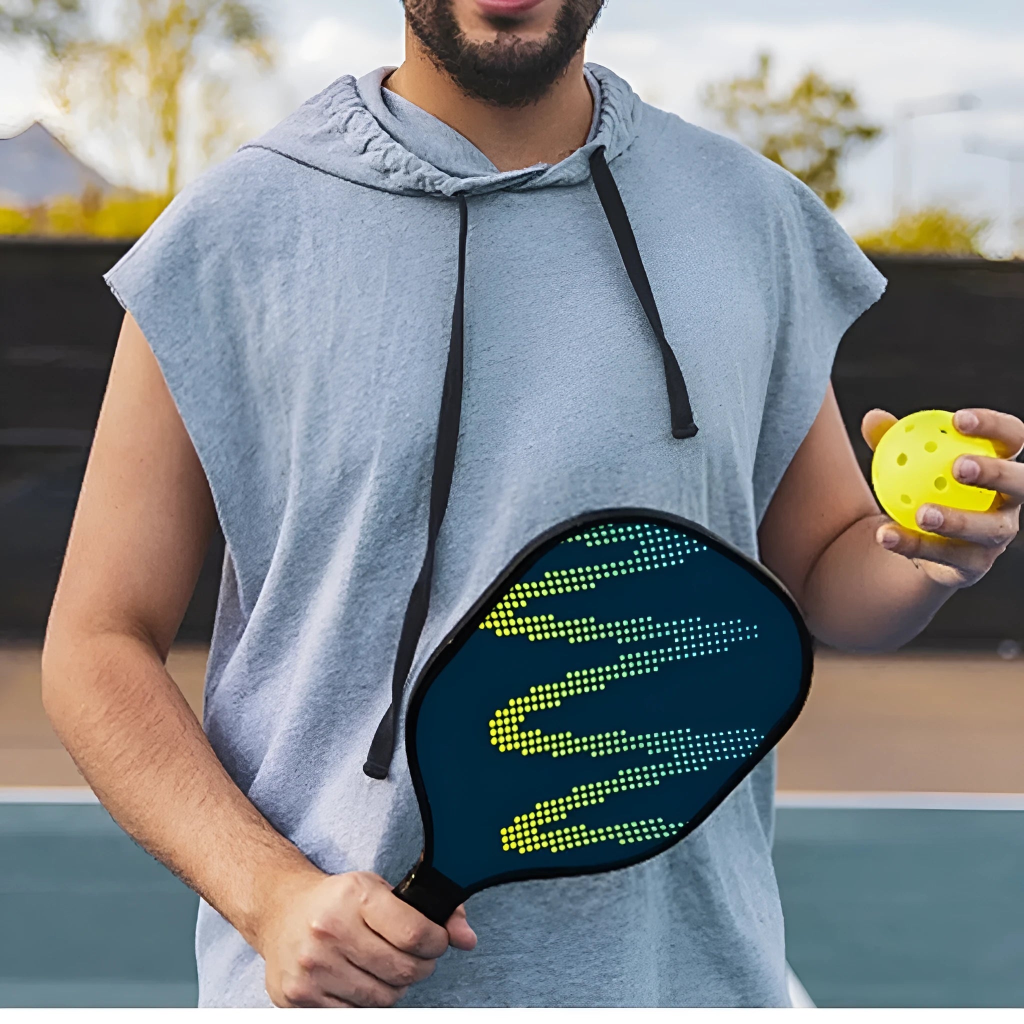 A high-density fibreglass table tennis racket for outdoor sports use.