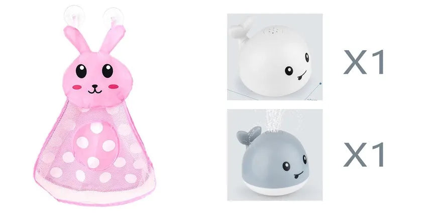 White and blue electric whale bath toy spraying water with flashing lights on a bathroom surface.