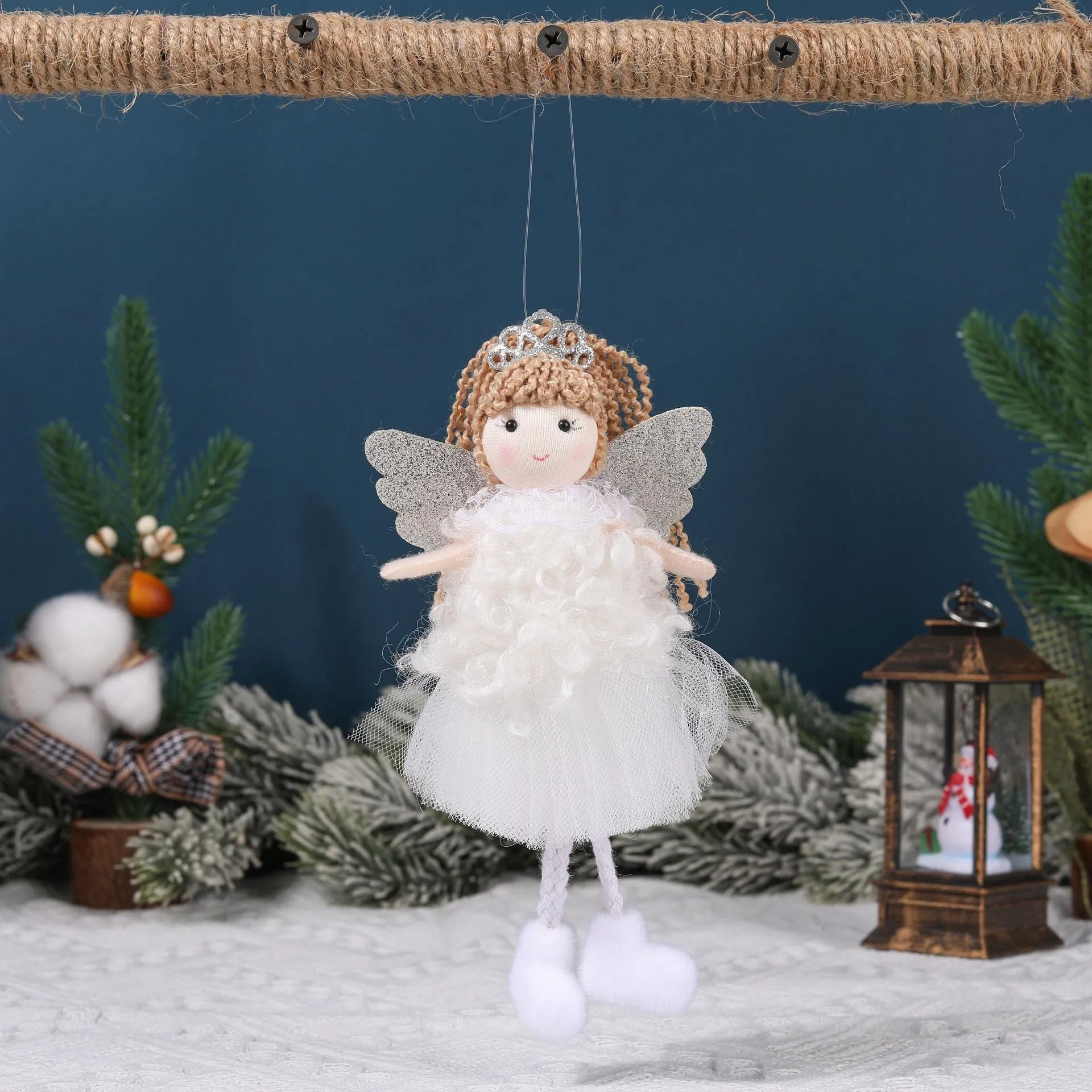Cartoon angel cloth hair clip for a girl's Christmas ponytail in khaki, pink, or white.