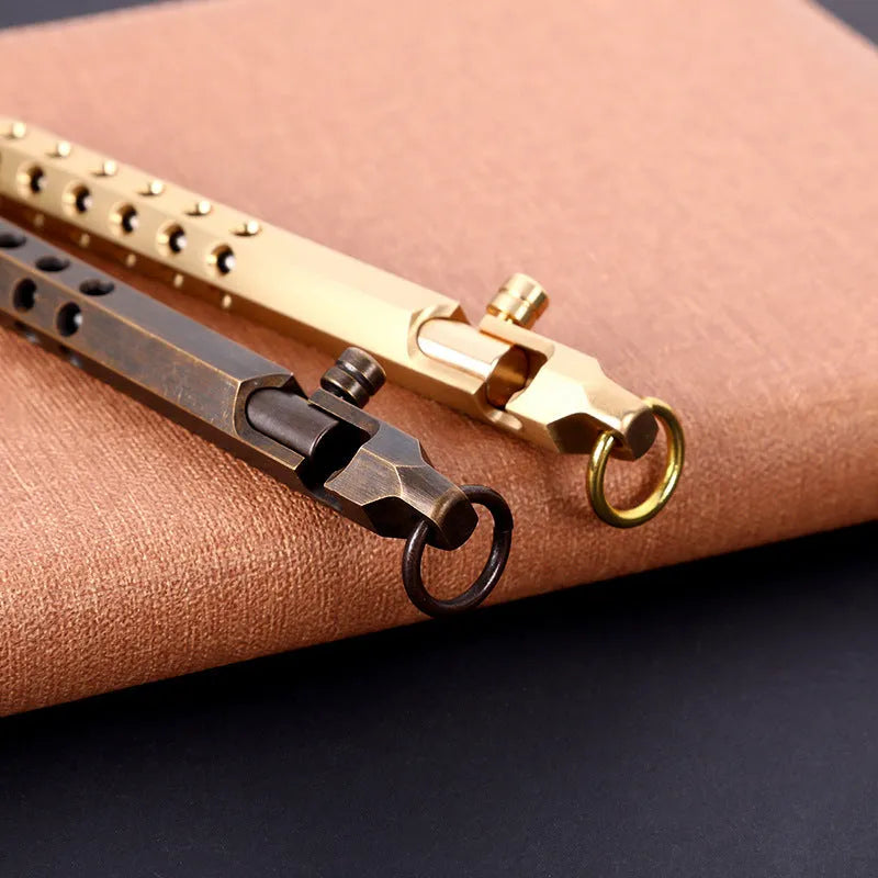 Brass hexagonal roller pen with six-angle barrel showing 0.5mm tip
