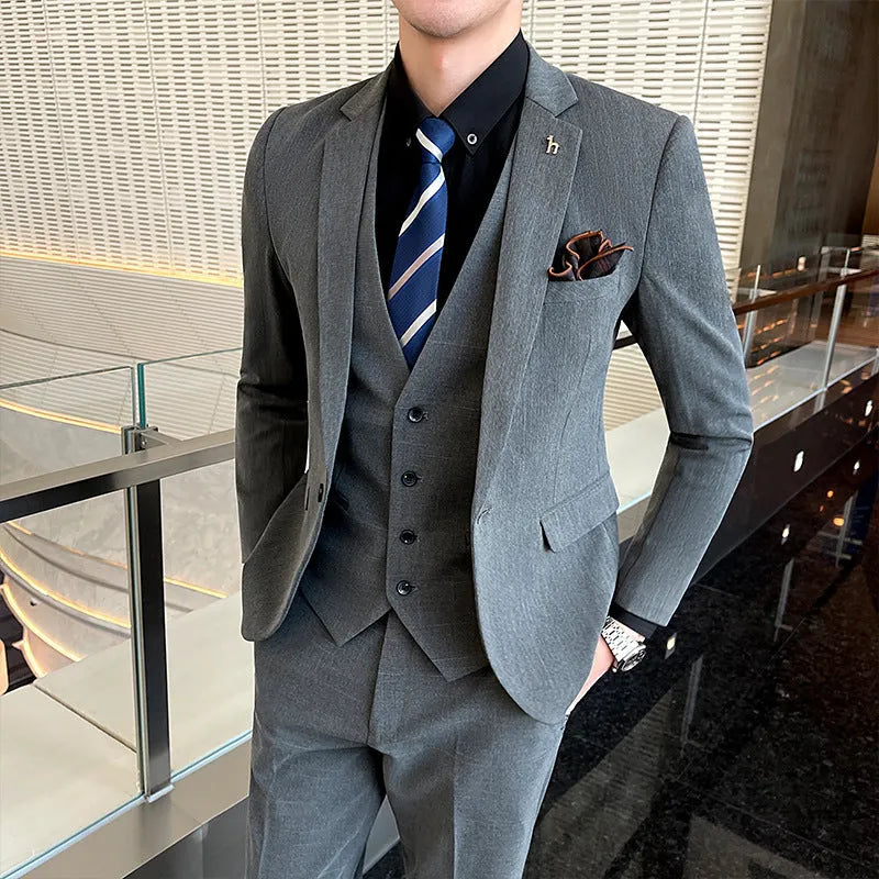 Men's slim fit suit in black and dark grey, cotton blend fabric, business formal wear set.