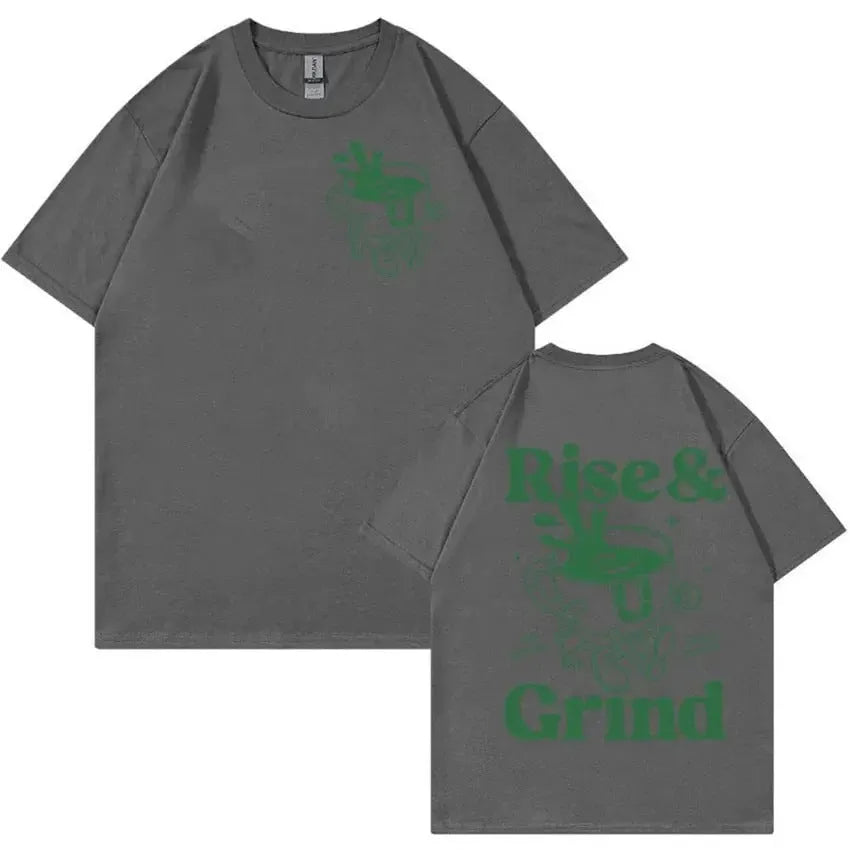Rise And Grind Green Coffee fun expression printed on a loose-fit linen blend cartoon t-shirt.