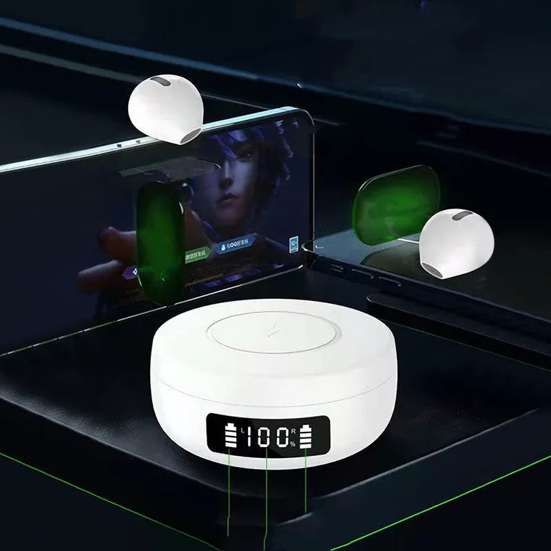 Mini black and white semi-in-ear wireless headphones with their wireless charging case on a table.