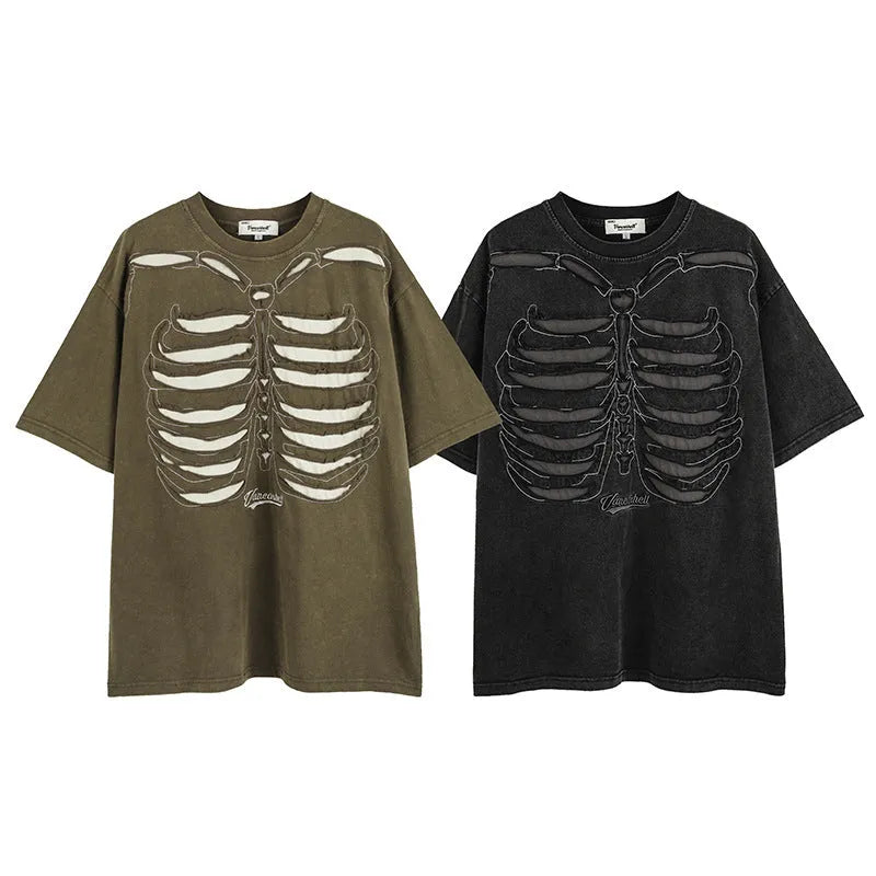 Man modelling a brown loose-fit cotton T-shirt with a printed skull graphic on the front.