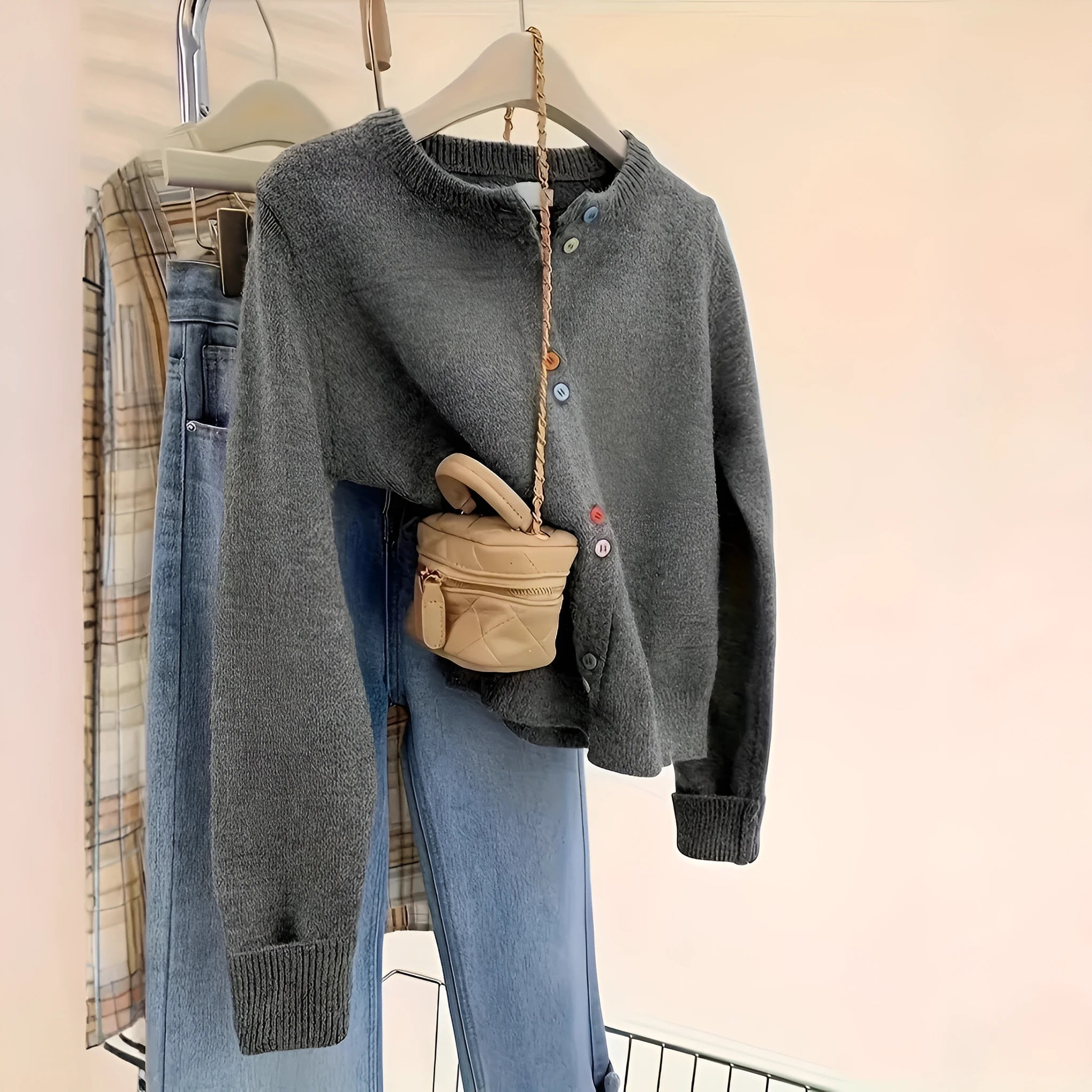 Dark grey women's button-front cardigan sweater with regular sleeves