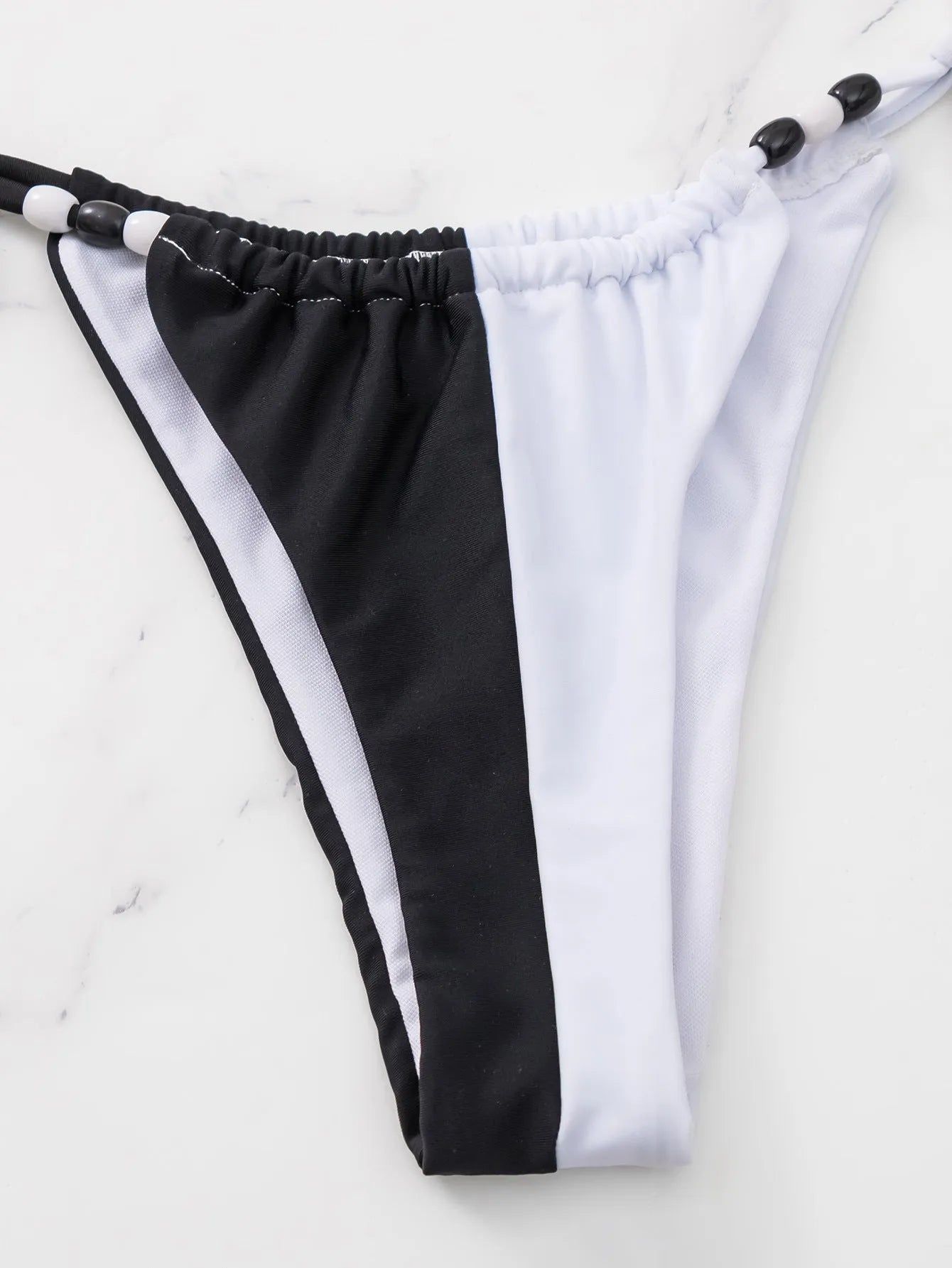 Black and white women's lace-up triangle cup bikini swimsuit set