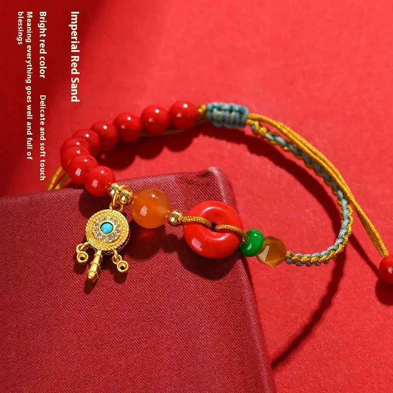 Cinnabar peace buckle woven bracelet in emperor red sand colour with hand-woven geometry design