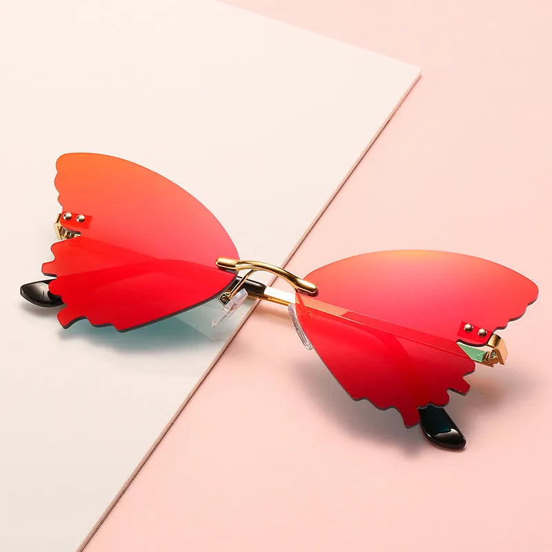 Butterfly rimless sunglasses with UV400 protection in vintage style plastic and metal frame