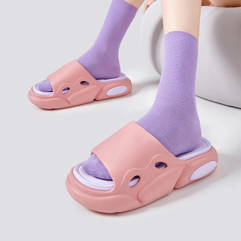 Pink purple and white green two-colour unisex slippers with thick EVA sole and leather lining.