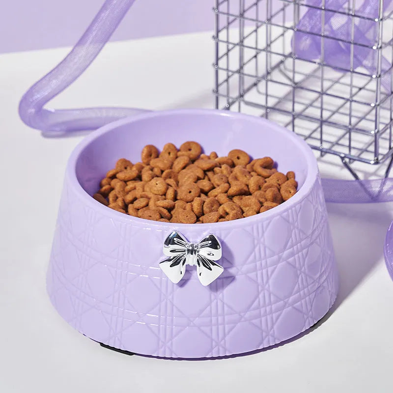 Decorative pet bowl with diamond pattern and bowknot decoration in multiple colour options