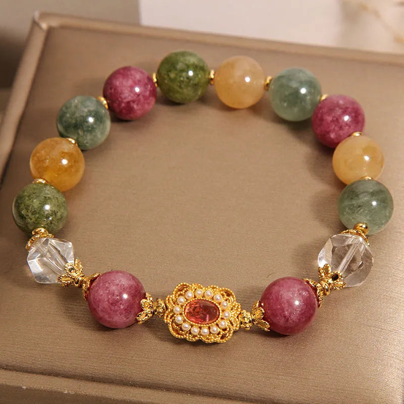 Women's jade colour tourmaline bracelet with alloy setting and rhinestone elements on pearl crystal base