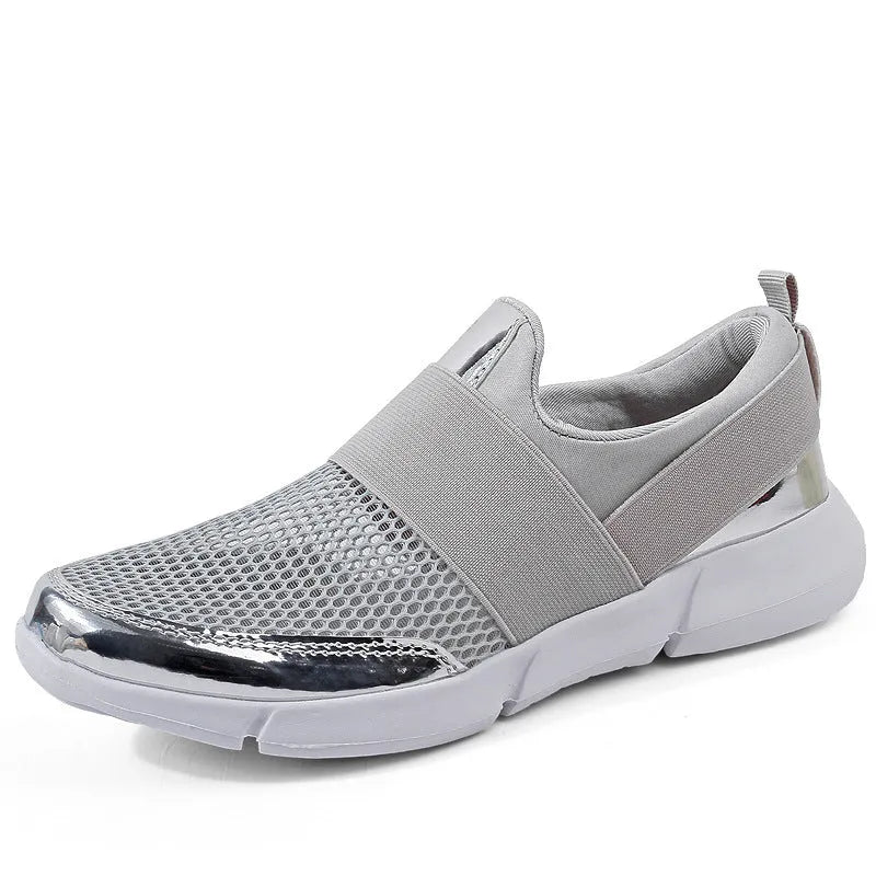 Blue, black, and grey women's low-top sneakers with mesh interior and casual design.