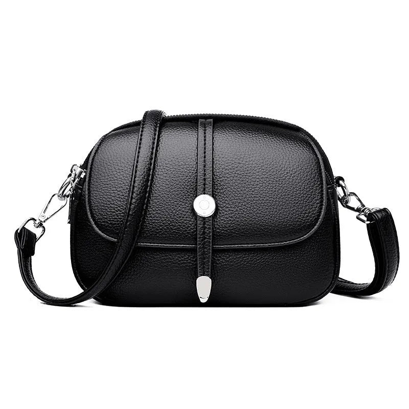 City Simple women's crossbody shoulder bag in soft PU leather with oval suitcase shape and sewing thread detailing