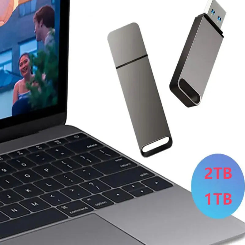 Customisable metal USB flash drive in black, red, or silver colours showing high storage capacity options.