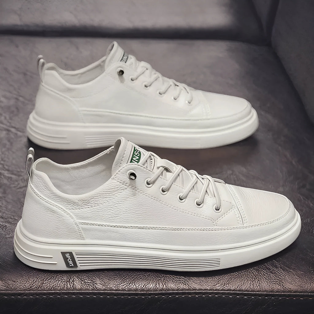 Men's white casual flat shoes with round toe and PU upper on a plain background