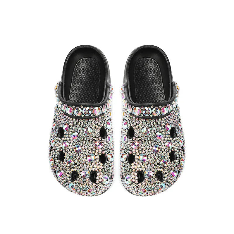 Black women's platform sandals with rhinestone detailing on EVA upper and sole.