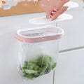 Blue plastic kitchen garbage bag storage rack mounted on wall