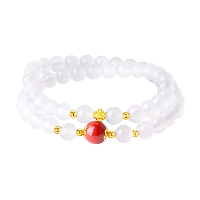 White double layer agate bracelet with 6mm geometry-shaped beads on a wrist