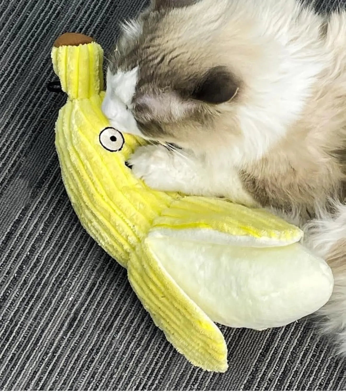 Yellow banana-shaped plush cat toy with crinkle sound feature for chewing and kicking