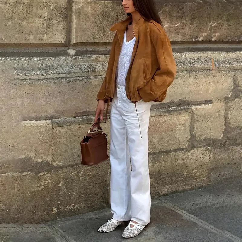A solid colour loose-fit retro-style polyester jacket for men and women.