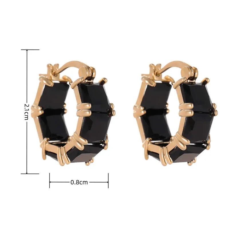 Geometric U-shaped drop earrings with zircon stones in black, pink or white colours on gold electroplated copper