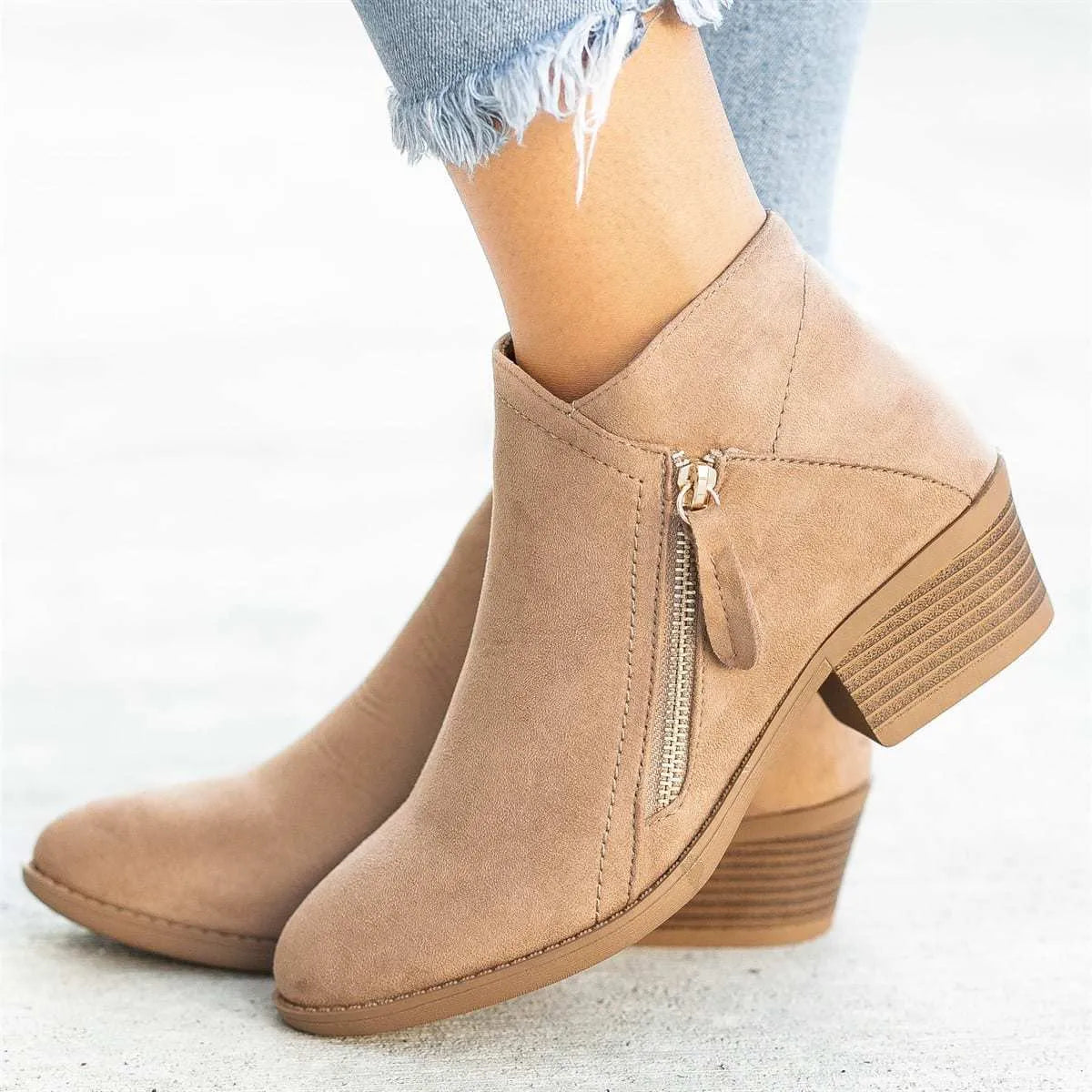 Women’s suede leather ankle boots with side zipper, thick heel, pointed toe, and non-slip sole in beige colour