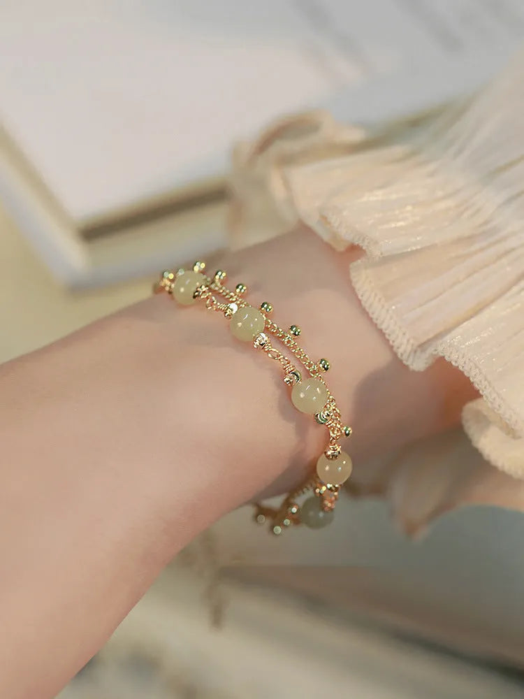 Natural Hetian Jade bracelet with Princess Running beaded design for women