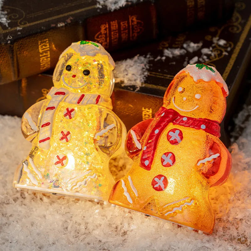 Glowing plastic gingerbread man snowman Christmas ornament with scarf in one of four colour options.