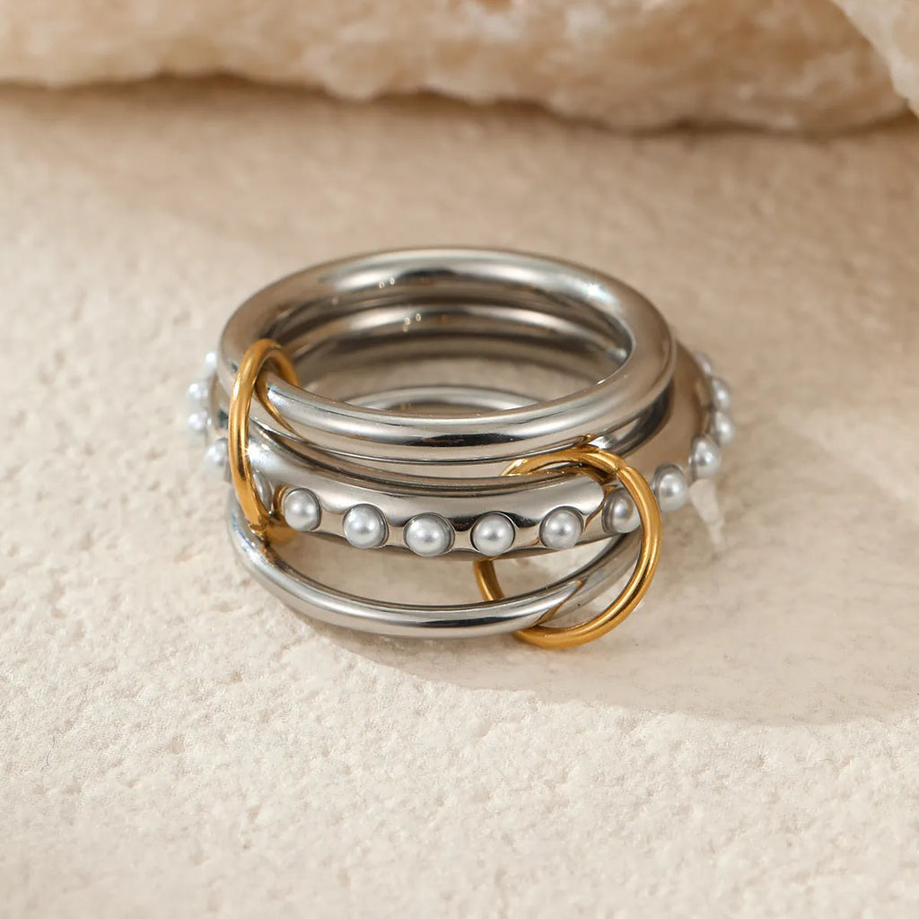 Gold plated stainless steel stackable ring set in three colour options for women