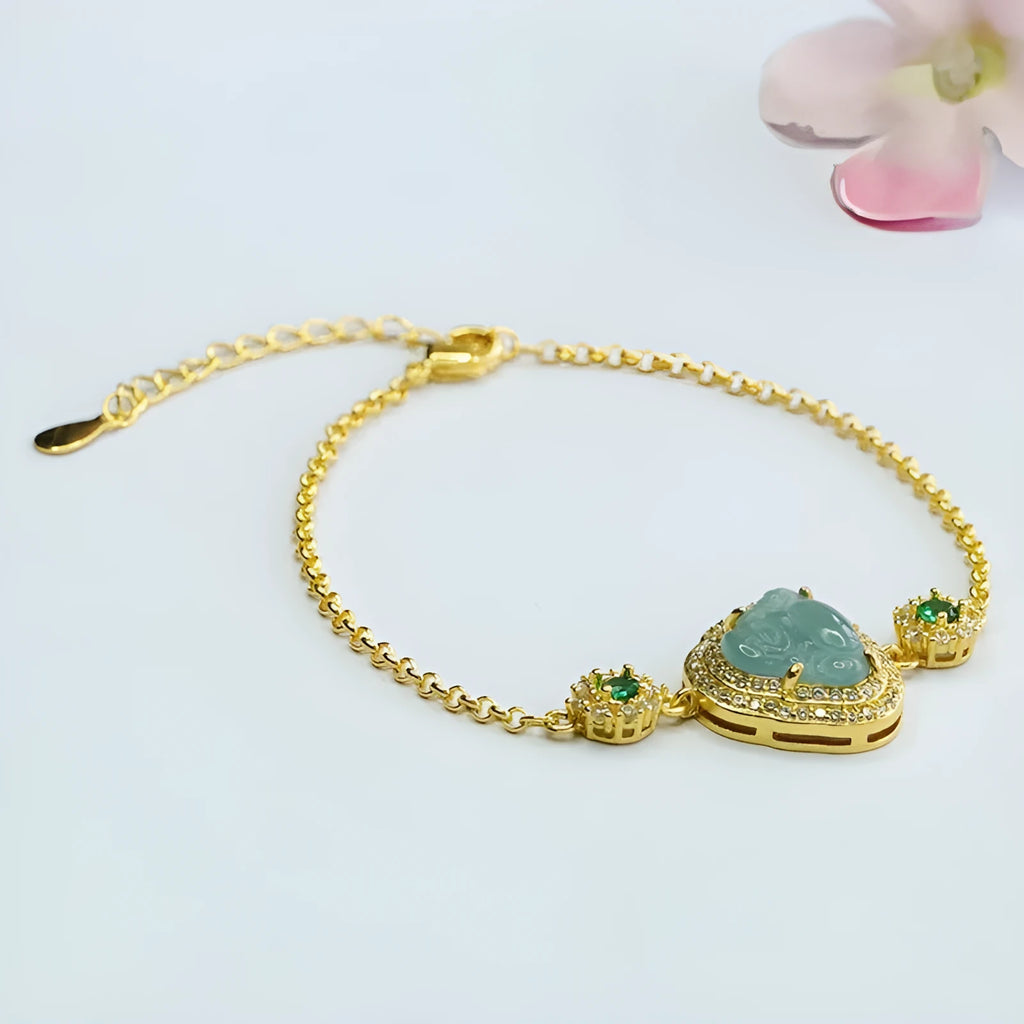 Emerald blue water jade bracelet with inlaid Maitreya Buddha charm measuring 10x13mm.