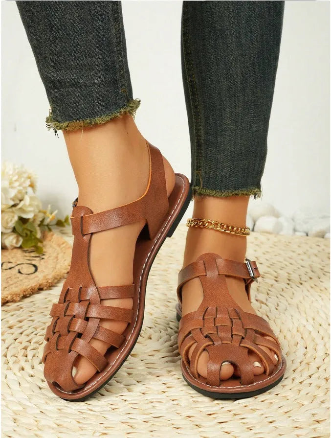 Dark brown women's vintage weave sandals with closed round toe, buckle fastening, and a low-top PU upper.