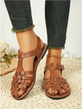 Dark brown women's vintage weave sandals with closed round toe, buckle fastening, and a low-top PU upper.