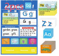 Alphabet learning chart with letter cards, word cards, and picture cards laid out on a table.