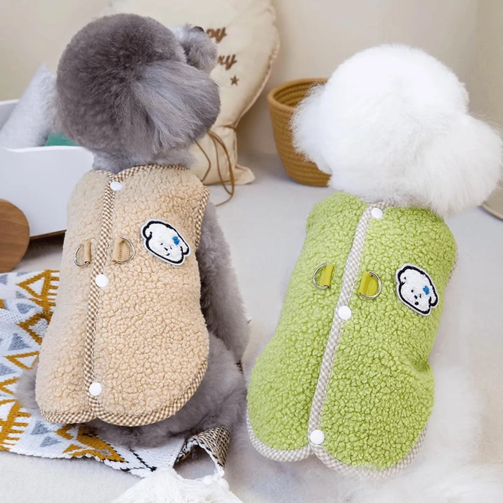 Green coral fleece dog vest with a leash ring on a small dog, showing the sleeveless design.