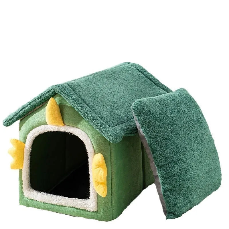 Large grey closed cat nest pet bed with a thick removable cushion inside, shown next to a tabby cat.