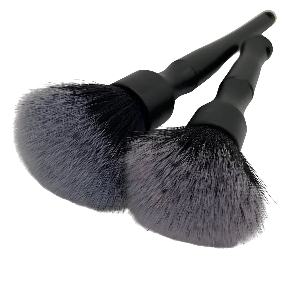 Black car detailing brush with ultra-soft pig hair bristles in two size options for gentle interior cleaning